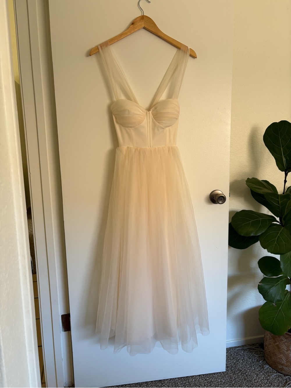 Cream tulle midi dress with sweetheart neckline lace up back and bow detail